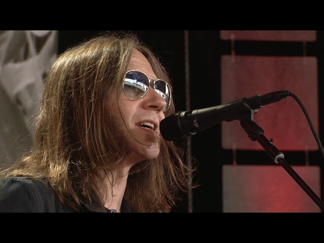 farm aid was started by willie nelson, neil